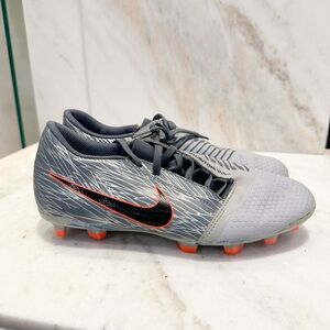 Nike Gray and Black Soccer Cleats with Orange Accents